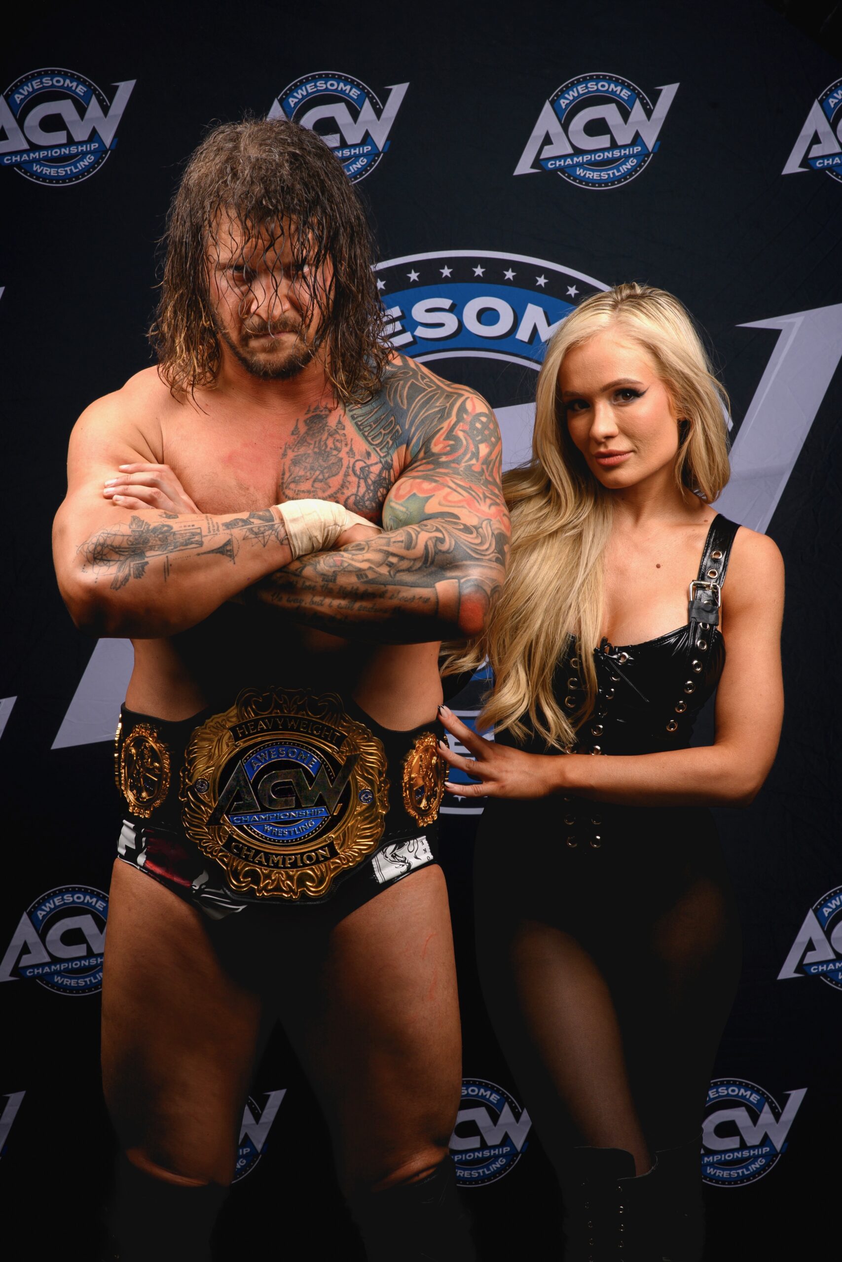 Awesome Championship Wrestling Heavyweight Champion Killer Kross with Scarlett Bourdreax